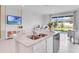 Modern kitchen with granite countertops and stainless steel appliances at 2204 Tongass Bnd, Davenport, FL 33837