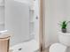 Bathroom with a shower stall and a toilet, modern and clean at 2204 Tongass Bnd, Davenport, FL 33837
