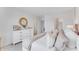 Main bedroom with dresser and plush bedding, bright and airy at 2204 Tongass Bnd, Davenport, FL 33837