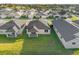 Aerial view of house and neighborhood at 212 Golden Sands Cir, Davenport, FL 33837