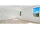 Bright bedroom with hardwood floors and large windows at 131 E Grant, Orlando, FL 32806