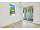 Bright dining room with sliding glass doors to backyard at 131 E Grant, Orlando, FL 32806