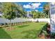 Fenced backyard with lush lawn and landscaping at 131 E Grant, Orlando, FL 32806