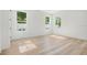 Spacious bedroom with hardwood floors and large windows at 131 E Grant, Orlando, FL 32806
