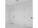 Bright bedroom with two doors and white walls at 131 E Grant, Orlando, FL 32806