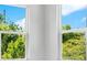 Two windows offer ample natural light and a view of the trees at 131 E Grant, Orlando, FL 32806