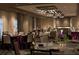 Elegant meeting room with tables set for an event at 14501 Grove Resort Ave # 1507, Winter Garden, FL 34787