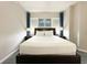 Comfortable bedroom with a queen bed and neutral decor at 14501 Grove Resort Ave # 1507, Winter Garden, FL 34787