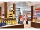 Well-lit gift shop with various merchandise and friendly staff at 14501 Grove Resort Ave # 1507, Winter Garden, FL 34787
