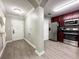 Entryway with wood-look flooring and adjacent kitchen at 14501 Grove Resort Ave # 1507, Winter Garden, FL 34787