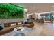 Relax in the comfortable lobby lounge with a living wall at 14501 Grove Resort Ave # 1507, Winter Garden, FL 34787