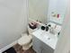 Bathroom features a toilet, sink, and vanity at 200 Afton Sq # 107, Altamonte Springs, FL 32714