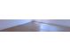 Light-colored hardwood floors in a bright, well-lit room at 13356 Sw 64Th Street Rd, Ocala, FL 34482