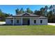 Charming one-story home with covered porch at 13356 Sw 64Th Street Rd, Ocala, FL 34482