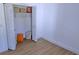 Well-organized walk-in closet with built-in shelving and hanging rods at 13356 Sw 64Th Street Rd, Ocala, FL 34482