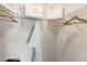 Bright walk-in closet with shelving and hanging rods at 1502 Isleta Loop, Kissimmee, FL 34741