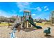 Community playground with playset, swings, and benches at 1502 Isleta Loop, Kissimmee, FL 34741