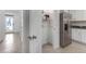 Open pantry with shelving next to kitchen at 1502 Isleta Loop, Kissimmee, FL 34741