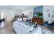 Open concept living room and kitchen with modern decor at 1502 Isleta Loop, Kissimmee, FL 34741