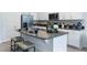 Modern kitchen with stainless steel appliances and granite countertops at 1502 Isleta Loop, Kissimmee, FL 34741