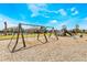 Community playground with swings and playset at 1502 Isleta Loop, Kissimmee, FL 34741