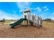 Community playground with double slide and playset at 1502 Isleta Loop, Kissimmee, FL 34741