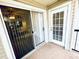 Private patio with sliding glass door and exterior door access at 1964 Lake Atriums Cir # 171, Orlando, FL 32839