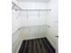 Walk-in closet with wire shelving for ample storage at 1964 Lake Atriums Cir # 171, Orlando, FL 32839