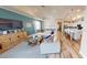 Open concept kitchen and living space with hardwood floors and modern appliances at 1681 Andover Ridge Dr, Deland, FL 32720