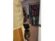 Walk in closet with clothes neatly arranged on shelves and hanging racks at 7104 Scruboak Ln, Orlando, FL 32818