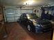 Attached garage with space for one car at 7104 Scruboak Ln, Orlando, FL 32818