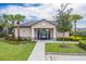 Community pool house with access gate and landscaping at 301 Primrose Dr, Davenport, FL 33837