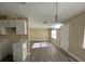 Open living room and kitchen area with modern floors at 641 Bayport Dr, Kissimmee, FL 34758