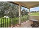 Private balcony overlooking the green space at 212 Crestrun Loop, Leesburg, FL 34748