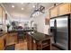 Kitchen features stainless steel appliances and large island with seating at 212 Crestrun Loop, Leesburg, FL 34748