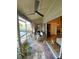 Covered patio with tiled floors and view of backyard at 2939 Falling Tree Cir, Orlando, FL 32837