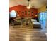Relaxing living room with sectional sofa and wood floors at 2939 Falling Tree Cir, Orlando, FL 32837
