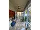 Covered patio with seating area and view of backyard at 2939 Falling Tree Cir, Orlando, FL 32837