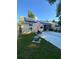 Backyard with patio, solar panels and fire pit at 2939 Falling Tree Cir, Orlando, FL 32837