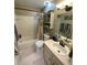 Clean bathroom with updated vanity and shower/tub at 2939 Falling Tree Cir, Orlando, FL 32837