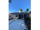 Backyard with patio, solar panels, and basketball hoop at 2939 Falling Tree Cir, Orlando, FL 32837