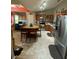 Eat-in kitchen with granite countertops and island at 2939 Falling Tree Cir, Orlando, FL 32837