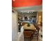 Open kitchen with island and breakfast bar at 2939 Falling Tree Cir, Orlando, FL 32837