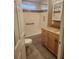 Clean bathroom featuring a tub, shower, and updated vanity at 14902 Arrena Rd, Winter Garden, FL 34787