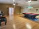 Game room with hardwood floors and a pool table at 14902 Arrena Rd, Winter Garden, FL 34787