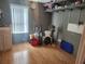 Laundry room with storage and vinyl flooring at 14902 Arrena Rd, Winter Garden, FL 34787