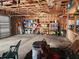 Organized garage with overhead storage at 14902 Arrena Rd, Winter Garden, FL 34787