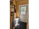 Inviting entryway with built-in shelving and bench at 14902 Arrena Rd, Winter Garden, FL 34787