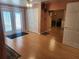 Versatile bonus room with hardwood floors and access to patio at 14902 Arrena Rd, Winter Garden, FL 34787