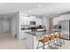 Modern kitchen with island, stainless steel appliances, and granite countertops at 3519 Lounging Wren Ln, Bartow, FL 33830